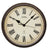 Horloge murale avec boîtier rond marron, chiffres romains et aiguilles