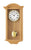 Horloge murale en bois avec cadran rond et chiffres romains ; poids de pendule en laiton
