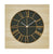 Horloge murale avec cadre rond en bois, cadran sombre et lignes dorées, logo AMS