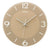 Horloge murale ronde avec cadran marron clair, chiffres arabes et aiguilles en métal