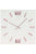Horloge murale blanche avec chiffres en aluminium rosé et aiguilles fines
