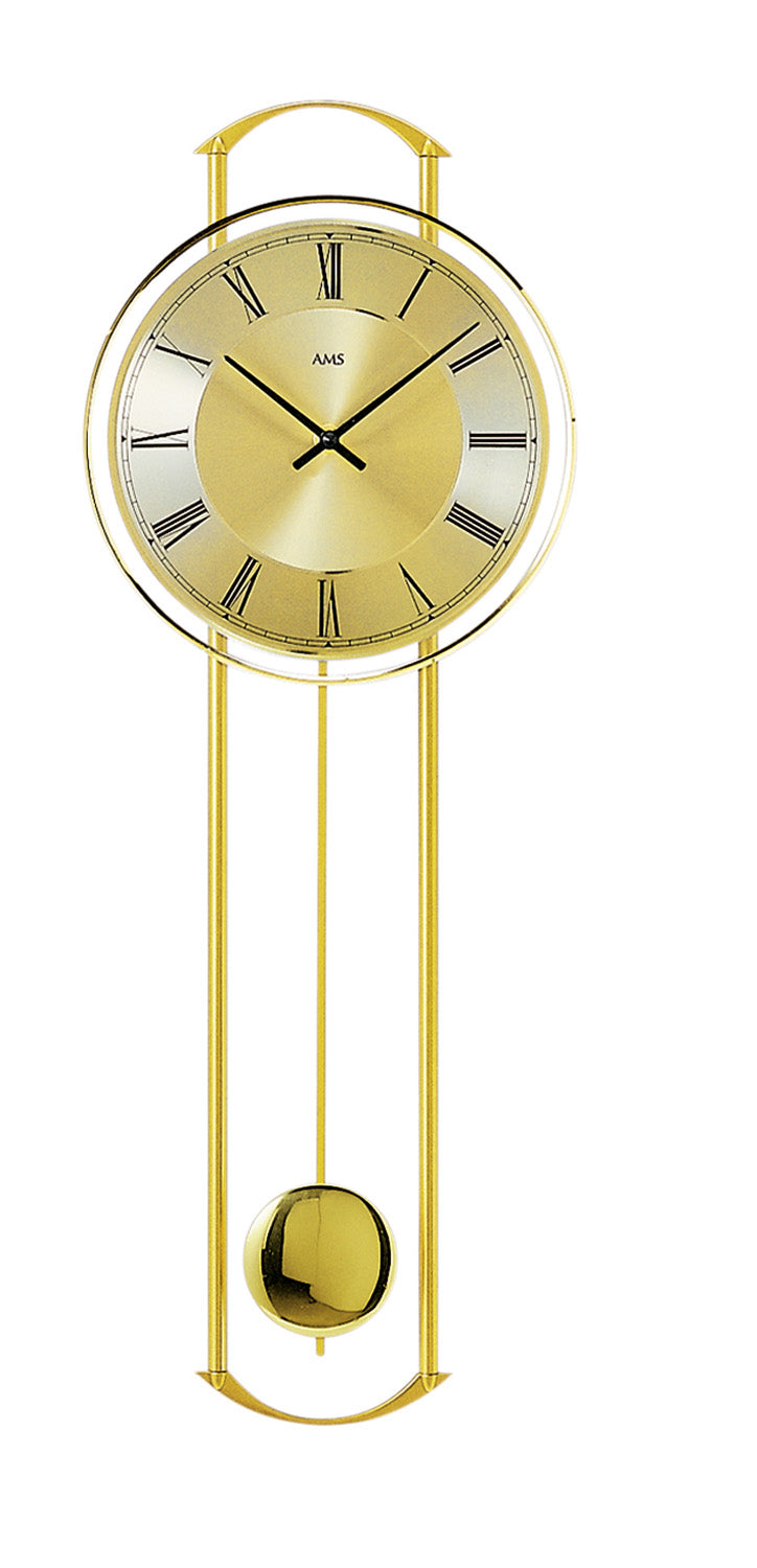 Horloge murale couleur laiton avec cadran rond et pendule visible