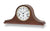 Horloge de table avec cadran rond, chiffres romains et boîtier en bois couleur noyer