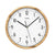 Horloge murale aspect bois : boîtier rond, cadran blanc, aiguilles noires, logo AMS