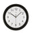 Horloge murale radio-pilotée noire avec cadran blanc et aiguilles noires, boîtier rond