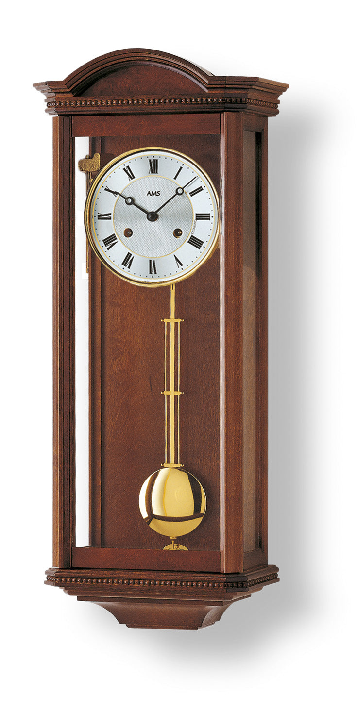 Horloge murale couleur noyer avec cadran blanc et balancier en laiton