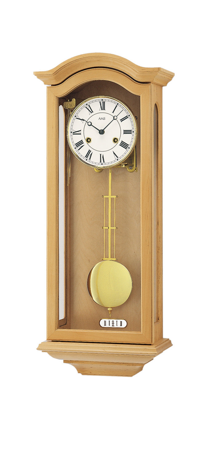Horloge murale avec cadran régulateur dans un boîtier en bois, pendule visible