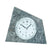 Horloge de table avec cadran analogique et boîtier rond en pierre naturelle grise