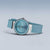 Bering Damenuhr mit blauem Zifferblatt und türkisfarbenem Silikonarmband, seitlich