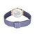 Montre pour femme avec bracelet milanais bleu, fermoir de boîtier couleur or rose, fond transparent