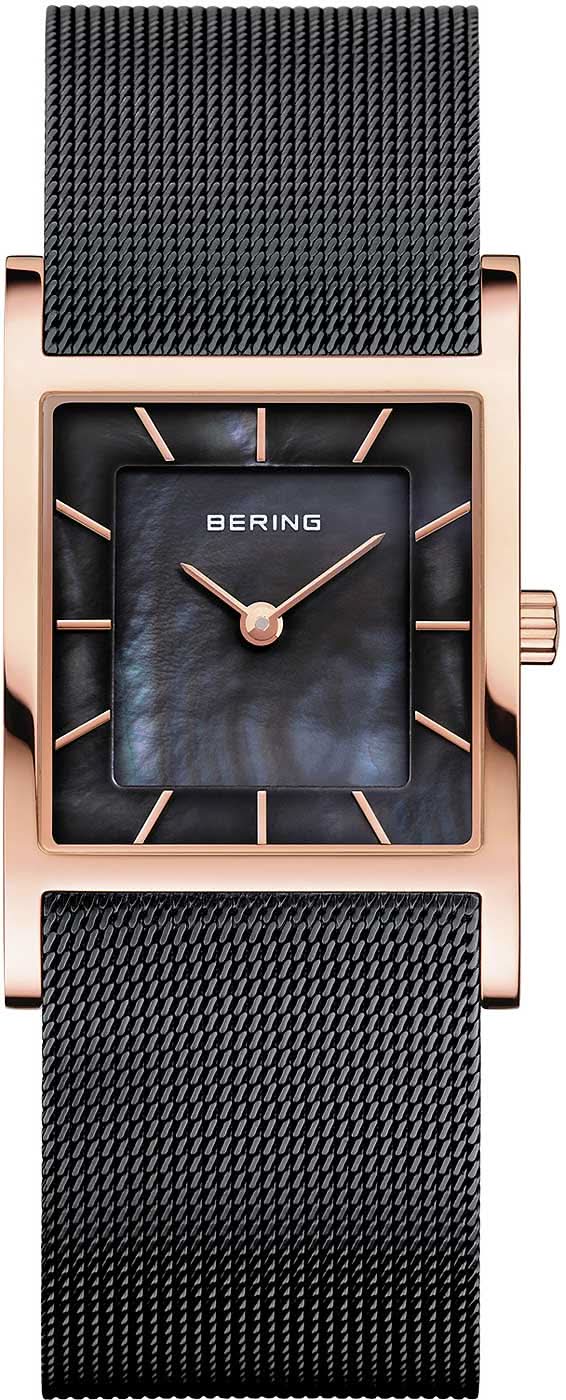 Montre pour femme avec cadran foncé, boîtier couleur or rose et bracelet en maille milanaise.