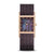 Bering Damenuhr mit roséfarbenem Gehäuse, dunklem Armband und blauem Zifferblatt mit Goldzeigern