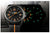 Montre homme avec cadran noir et index luminescents vert/orange ; bracelet textile noir
