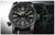 Montre homme avec cadran noir et index luminescents verts, bracelet noir