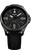 Montre homme avec cadran noir, index luminescents et affichage de la date « 83 »