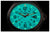 Montre homme avec boîtier noir, cadran turquoise lumineux et bracelet textile noir