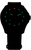 Cadran de montre pour homme dans le noir avec des marqueurs lumineux verts et un accent orange