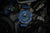 Bracelet de montre pour homme avec bracelet bleu, lunette bleue et aiguilles/index luminescents verts