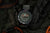 Montre homme avec cadran sombre, index luminescents verts et bracelet en textile