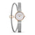 Bering Damenuhr mit Roségold-Lünette und silbernem Milanaise-Armband, rundes Zifferblatt