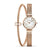 Bering Classic Damenuhr mit roséfarbenem Mesh-Armband und rundem Zifferblatt