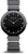 Montre pour femme avec cadran noir, index et lunette en céramique sur bracelet en acier inoxydable.