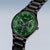 Montre homme noire avec boîtier rond, cadran vert et bracelet chaîne noir