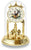 Horloge de table avec cadran rond, cloche en verre et balancier rotatif, design doré