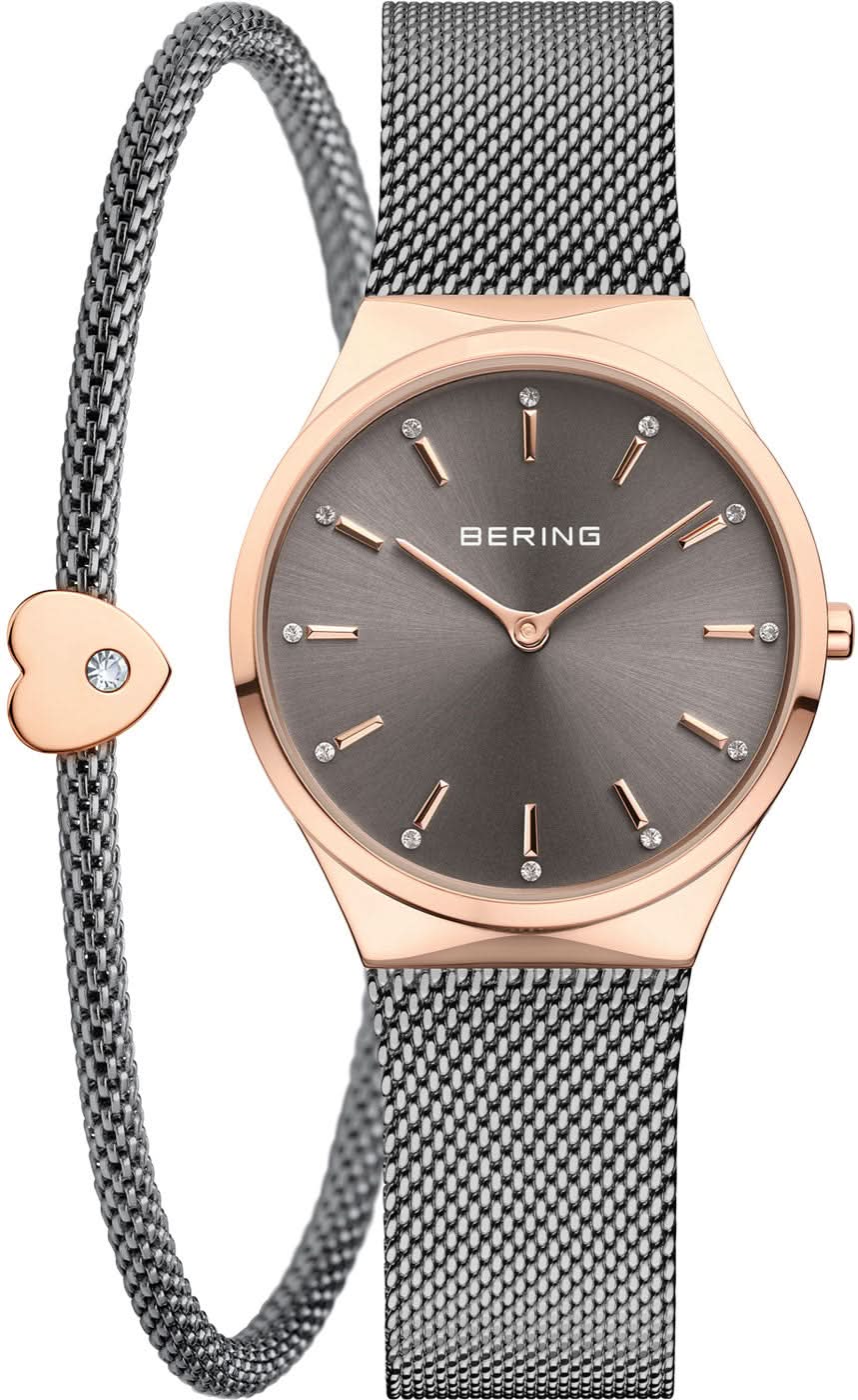 Montre pour femme avec cadran gris foncé, lunette or rose et bracelet milanais, pendentif cœur