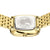 Dos de la montre dorée pour femme avec gravure sur le fond du boîtier et le bracelet.
