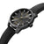Schwarze Herrenuhr mit Krone am Gehäuserand, Lederarmband und Batman×Police-Zifferblatt.
