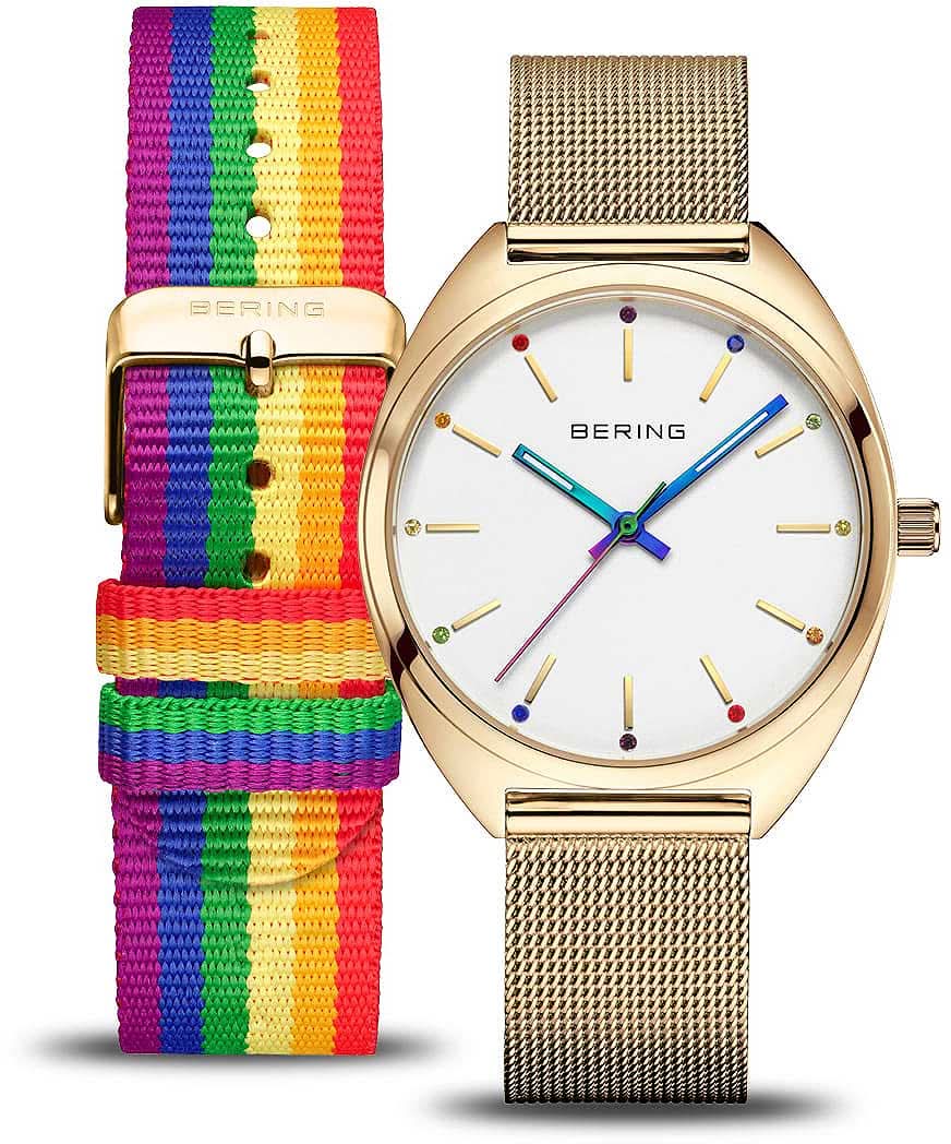 Damenuhr mit goldfarbenem Gehäuse und mehrfarbigem Streifenarmband aus Textil