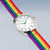 Bracelet avec boîtier argenté, cadran blanc et bracelet en nylon arc-en-ciel