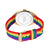 Bracelet avec fond de boîtier doré et bracelet en tissu arc-en-ciel