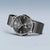 Bering Herrenuhr mit grauem Zifferblatt, Metallmaschenarmband und kleiner Sekunde
