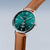 Herrenarmbanduhr mit grünem Zifferblatt, braunem Lederband und silberner Lünette.