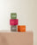 Quatuor de réveils LED cubiques empilables en vert, rose, gris et orange avec affichage