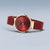 Montre Bering pour femme avec bracelet milanais rouge, boîtier rond plaqué or rose et cadran rouge