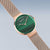 Bering Damenuhr mit grün gestreiftem Zifferblatt und roséfarbenem Mesh-Armband