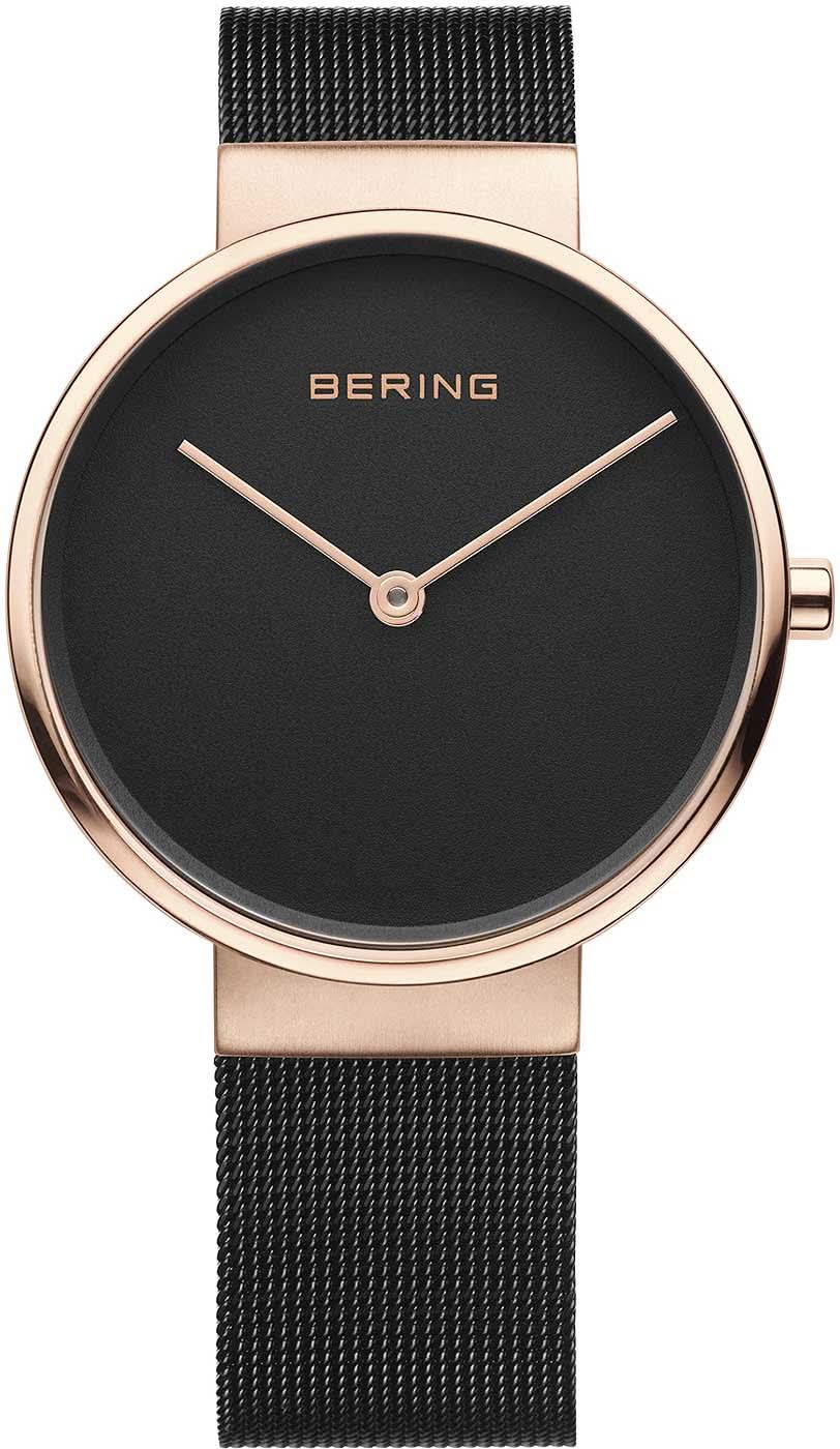 Montre avec cadran noir, lunette or rose et bracelet milanais noir