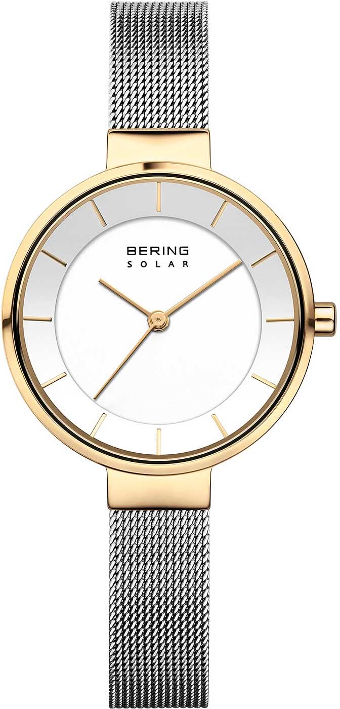 Goldfarbene Damenuhr mit weißem Zifferblatt und grauem Metallarmband im Mesh-Look