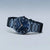 Herrenarmbanduhr Bering mit dunkelblauem Zifferblatt und breitem Metallarmband.