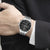 BOSS Herrenarmbanduhr am Handgelenk, schwarzes Zifferblatt, Edelstahlchronograph