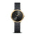 Montre Bering pour femme avec cadran noir, boîtier doré et bracelet milanais noir.