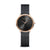 Bering Damenuhr mit schwarzem Metallband, dunklem Zifferblatt und roségoldener Lünette.