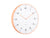 Horloge murale ronde avec anneau en fer orange et cadran blanc