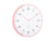 Horloge murale avec boîtier rond rose flamant, cadran blanc et aiguilles roses.