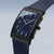 Montre pour homme avec cadran bleu et lunette noire, couronne sur le côté du boîtier