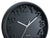 Horloge murale Karlsson avec cadran noir, aiguilles argentées et région 12/1 visible