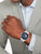 Herren-Automatikuhr am Handgelenk mit blauem Zifferblatt und silbernem Armband